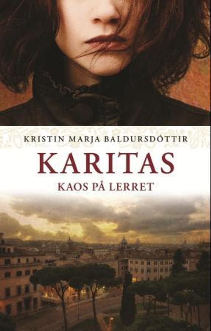 Karitas - kaos på lerret